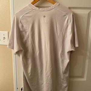 Men’s white lulu lemon v neck shirt